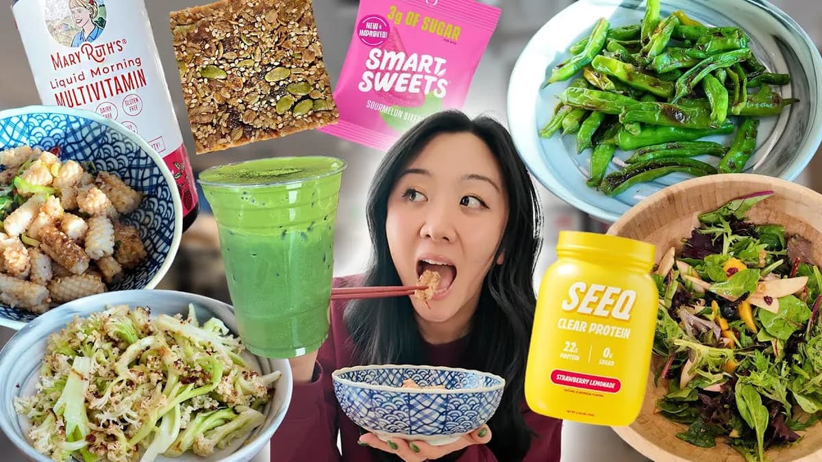 Jasmine Pak at her kitchen table with a dinner spread of shishito peppers, stir-fried cauliflower, and white pepper calamari